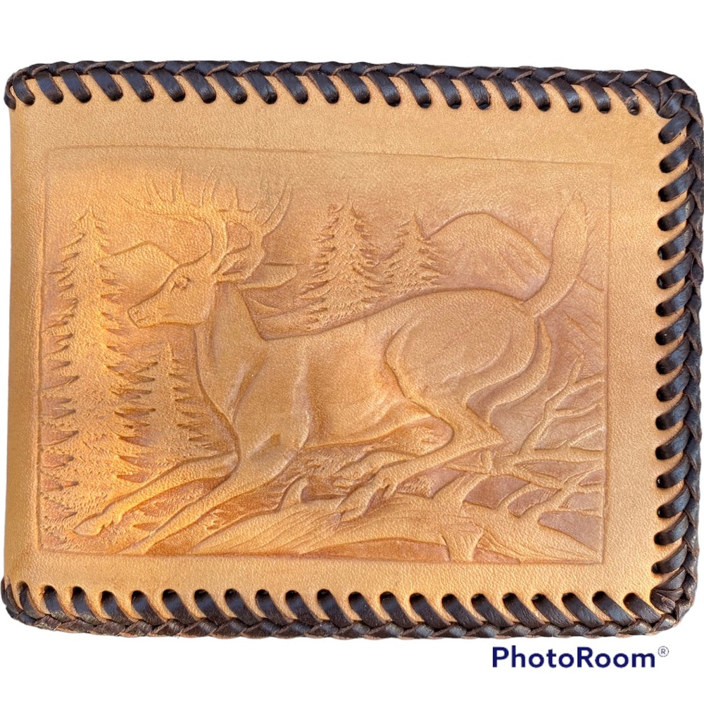 Vintage leather hand embossed deer design wallet.